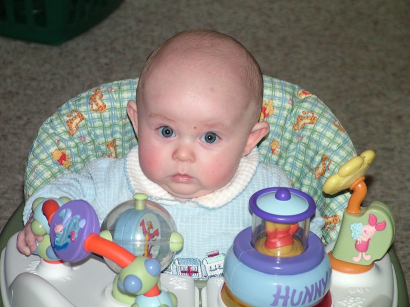Jakob playing in his walker