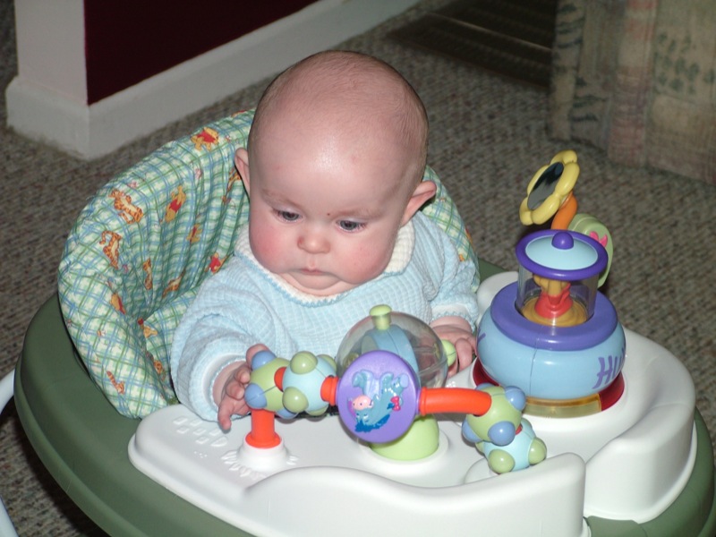 Jakob playing in his walker