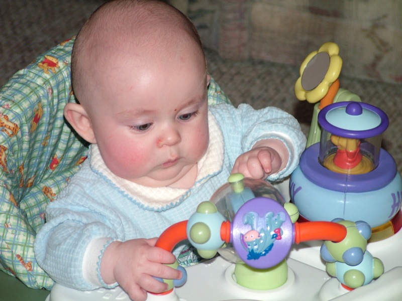 Jakob playing in his walker