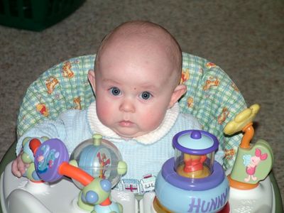 Jakob playing in his walker