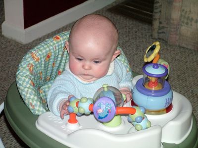 Jakob playing in his walker