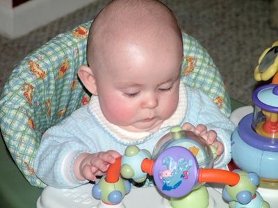 Jakob playing in his walker
