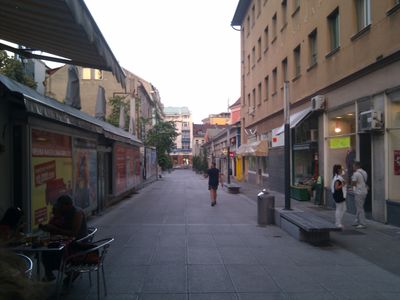 Side street filled with shops and restaurants
